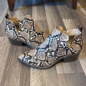 Woman’s snakeskin booties, size 6